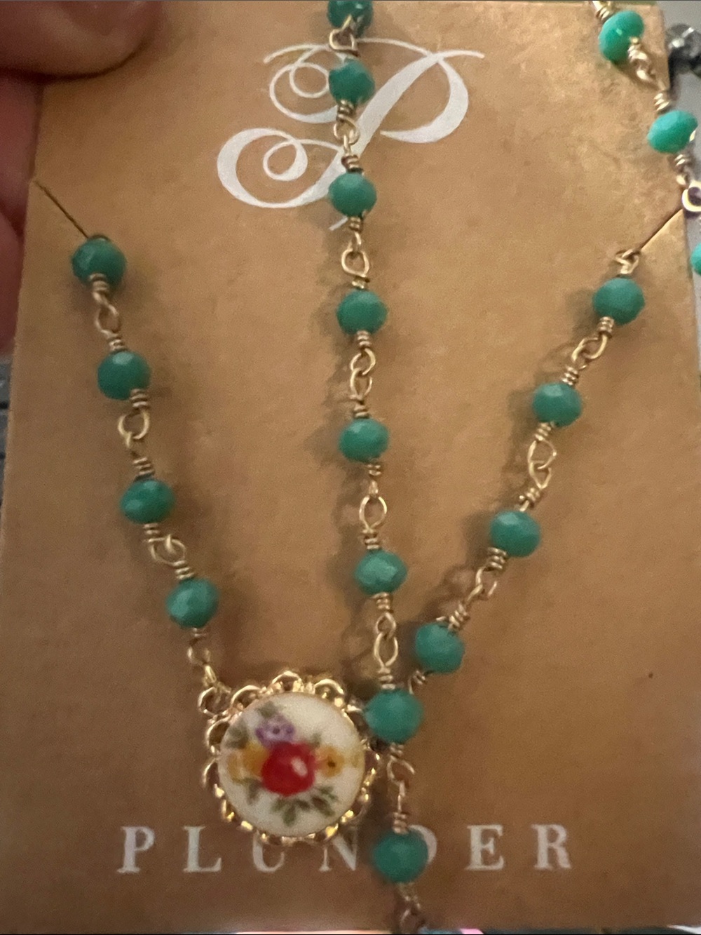 Plunder turquoise color beaded necklace with floral porcelain pendant